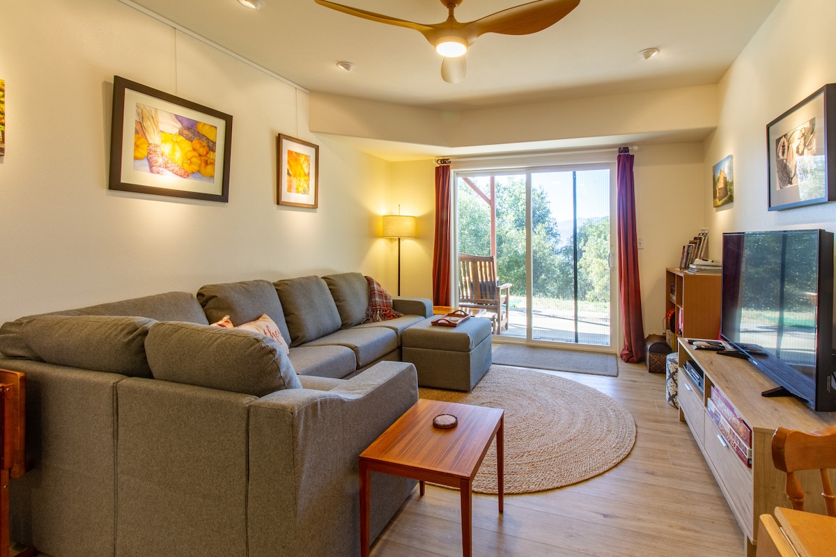 Comfortable living area, opens to private patio, with views!